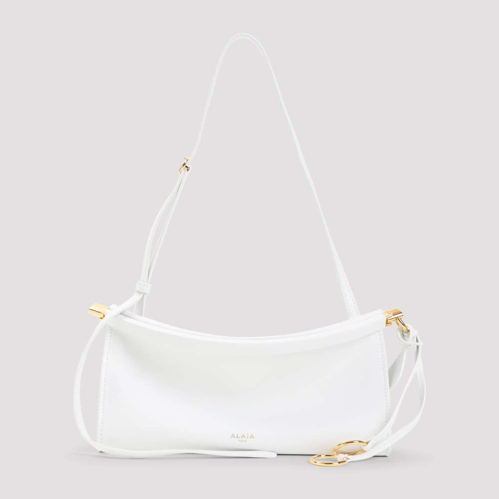 Shop Alaïa White Le Click East West Small Shoulder Bag