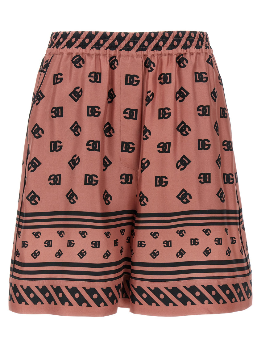 Dolce & Gabbana Pink Bermuda Shorts With Dg Logo Printed All-over In Silk Woman In Pink
