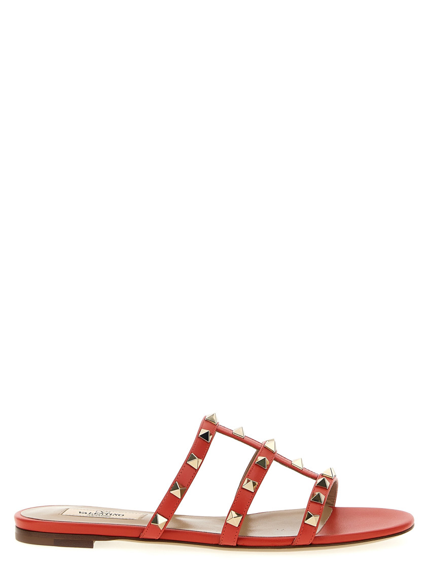 Valentino Rockstud Flat Sole Open Toe Sandals In Red