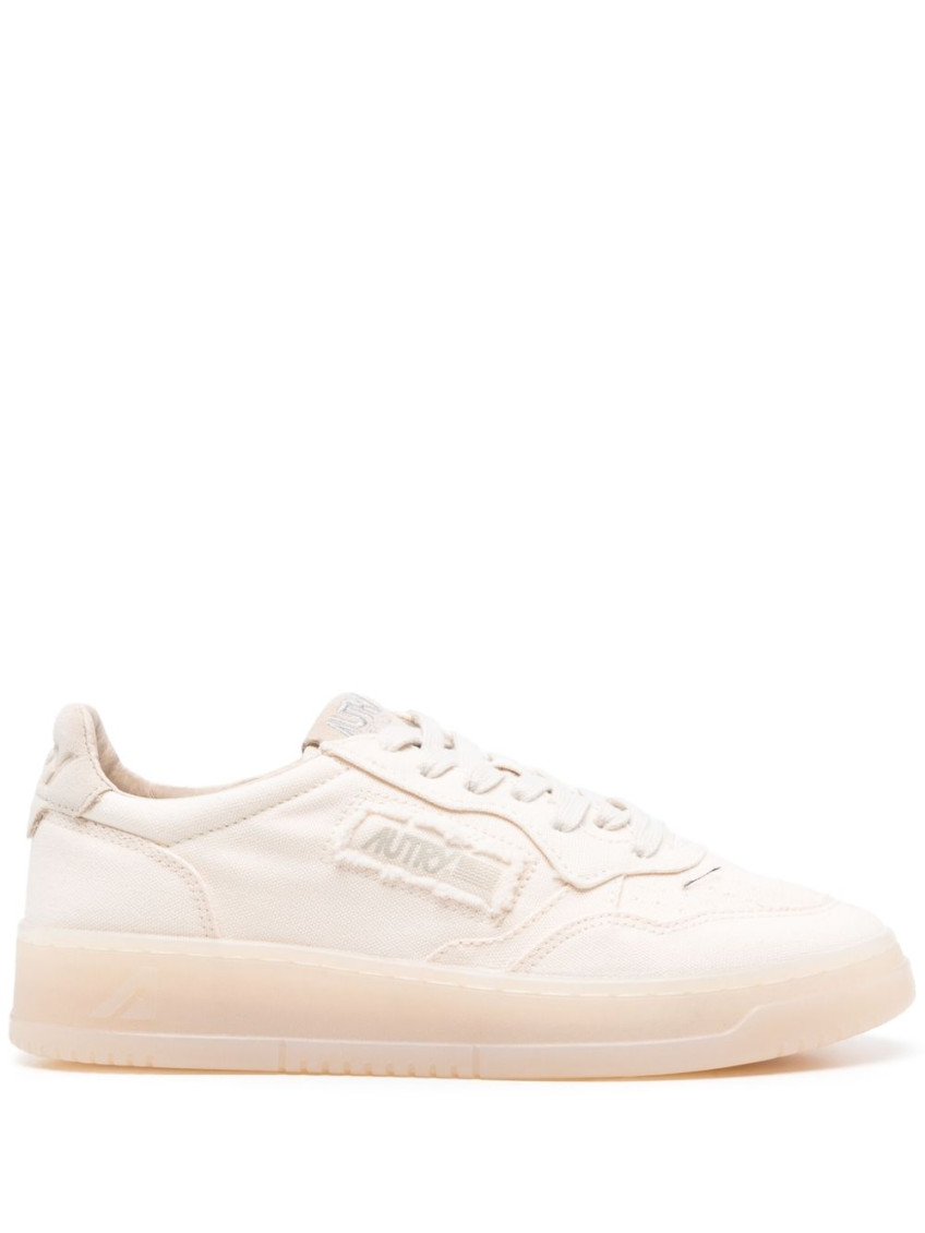 Shop Autry Off White Medalist Sneakers