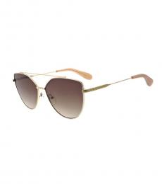 BCBGMaxazria Pale Gold Cat Eye Aviator Sunglasses